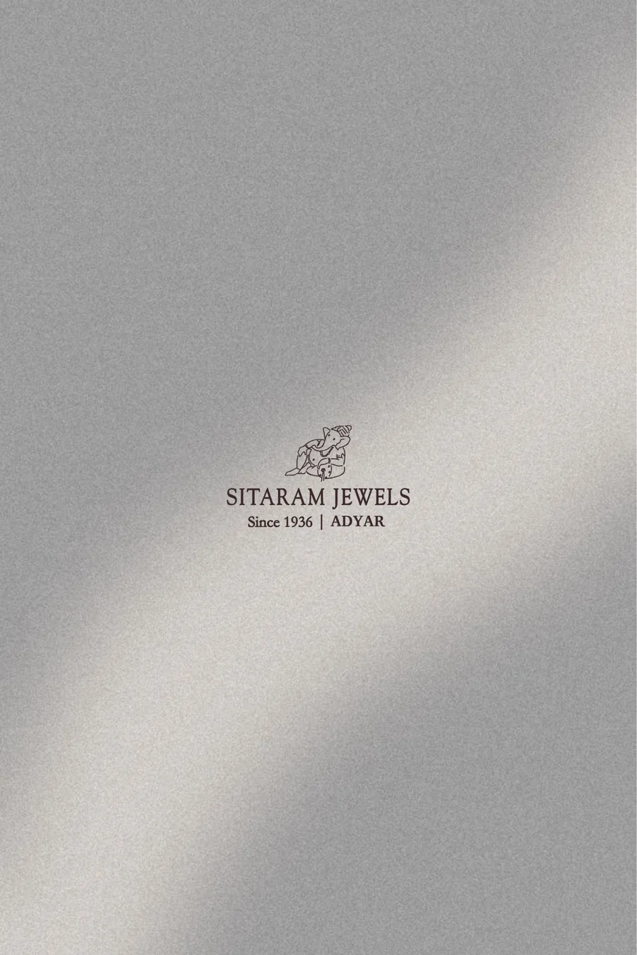 Booklet back — Sitaram Jewels mark